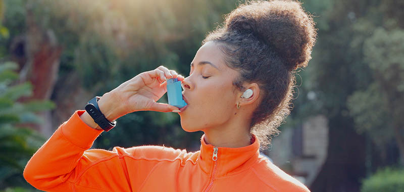 Women using an inhaler